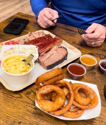 Pulled pork, ribs, brisket, cole slaw, mac and cheese, onion rings.