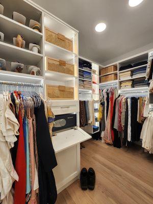 White Walk-in Closet with lighting