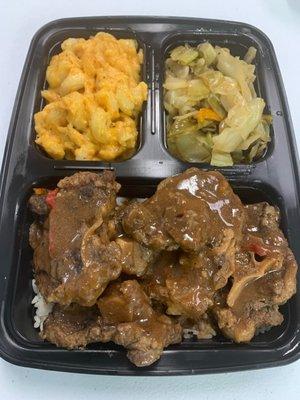 Savory Oxtails with mac n cheese and cabbage