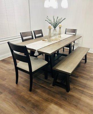 dining room table with chairs and bench