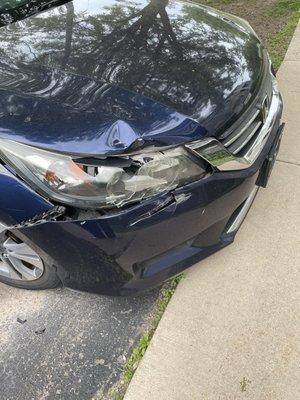 Damaged car of a disabled resident by hired roofers - management nasty and took NO responsibility when roofers dropped shingles and tools