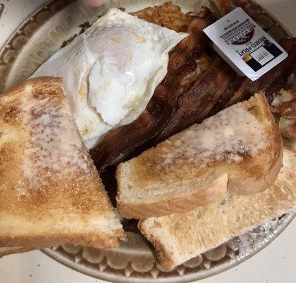 2 eggs, hash browns, bacon and toast