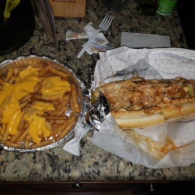 Cheese fries with whiz and buffalo chicken cheesesteak