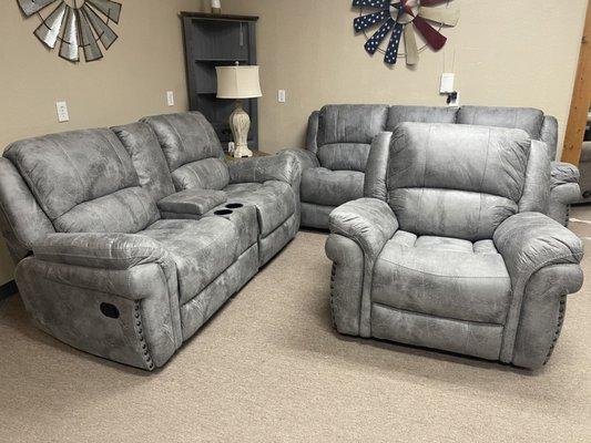 Grey, Reclining Sofa with drop down cup holders and Gliding-reclining loveseat Set $2399 Matching Recliner $699