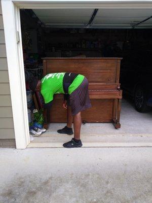 Upright Piano Honey get it out the garage Now move.