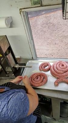 Making the freshest of sausages.