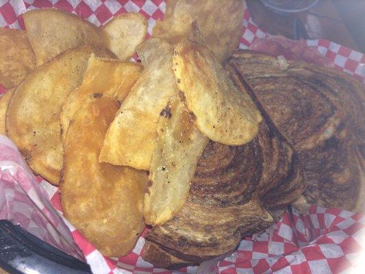 Reuben sandwich with homemade potato chips.