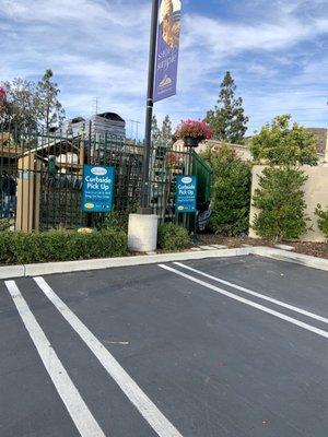 Designated curbside pickup parking spots