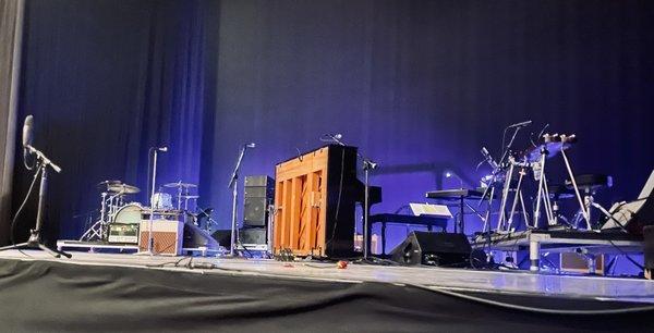 I was seated on right side viewing stage, third row, aisle. My view was perfect, as Dylan stands behind piano