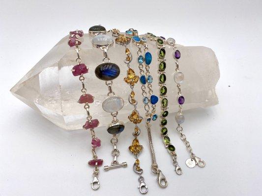 One-of-a-kind sterling silver bracelets with beautiful and unique rough, faceted or polished gemstones.