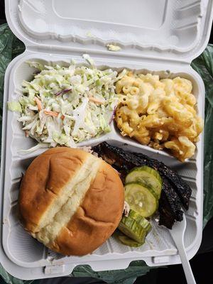 Pulled pork sandwich, brisket, Mac'n cheese, coleslaw