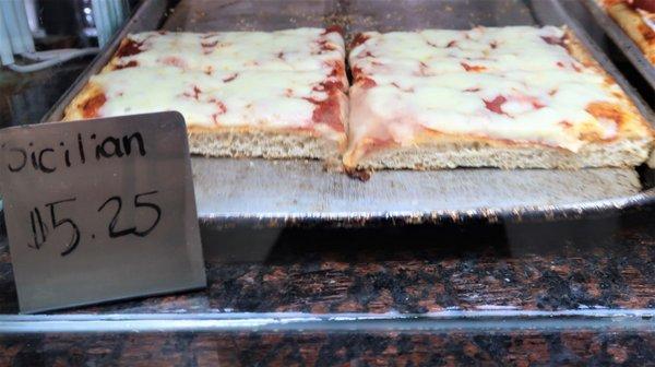 $5.25 for a small slice of Sicilian at lousy Famous Ben's Pizza on June 22, 2022. A ripoff joint ... caveat emptor!