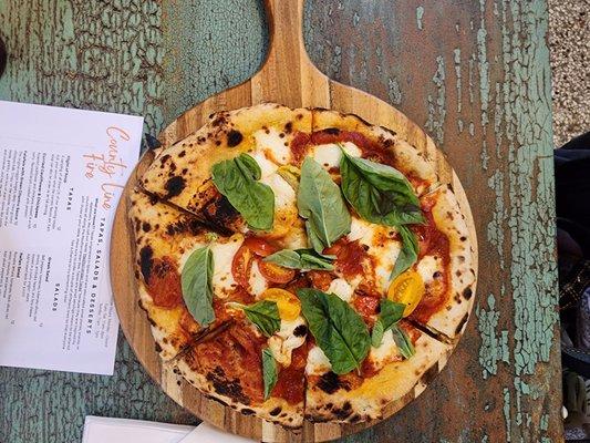 Margherita with fresh basil.