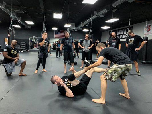 Grappling class teaches how to fight and defend yourself on the ground.