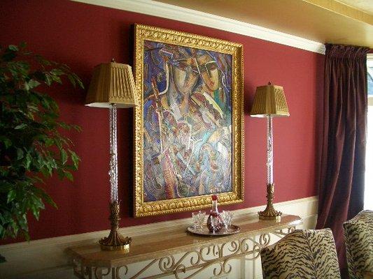 Diane added red walls & a gold foil ceiling to give the dining room warmth and drama.  One of my favorite rooms!