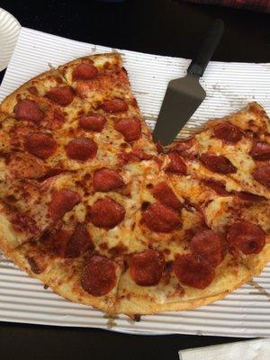 Large pepperoni pizza.