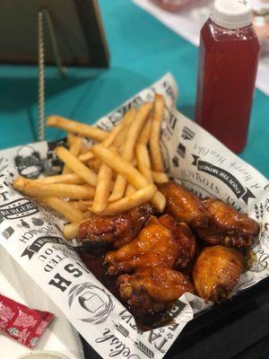 Memphis Mild Wings, Kool-Aide, and seasoned fries.