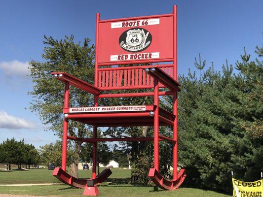 This place is out of business but the rocking chair still stands and it's red now!