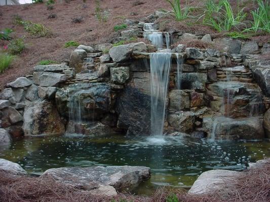 The "Oasis" shown on our website under "popular designs" a triple waterfall with grand "sheet" waterfall in center