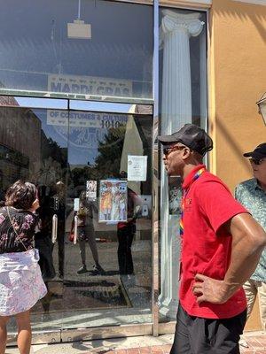 Tour guide explaining Maria Gras museum.