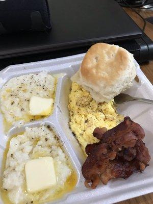 2 egg plate with grits, biscuit & bacon.