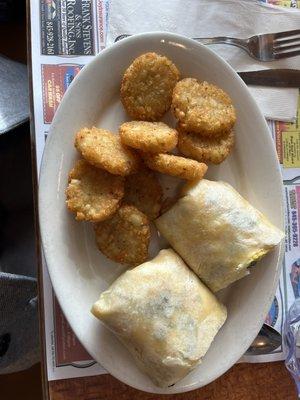 Portobello, pesto, mozzarella, egg wrap with potato pancakes