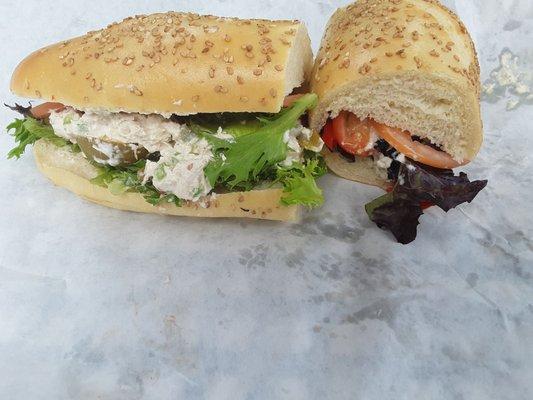 MTO  medium grilled - chicken salad sub Sesame with tomatoes, organic spring mix, & red and green peppers.