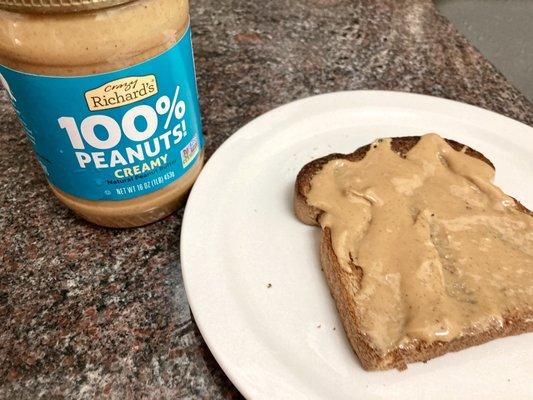 9pm snack on 01/01/2023 Nature's Own Whole Wheat Toast and Crazy Richard's Peanut Butter.