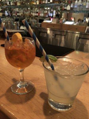 Happy hour aperol spritz and mezcal margarita