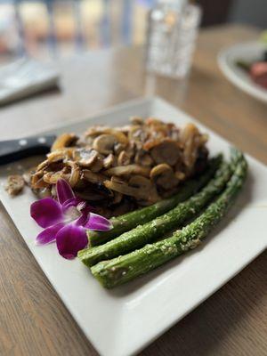 12oz New York Steak topped with grilled onions and mushrooms very delicious strongly recommend.