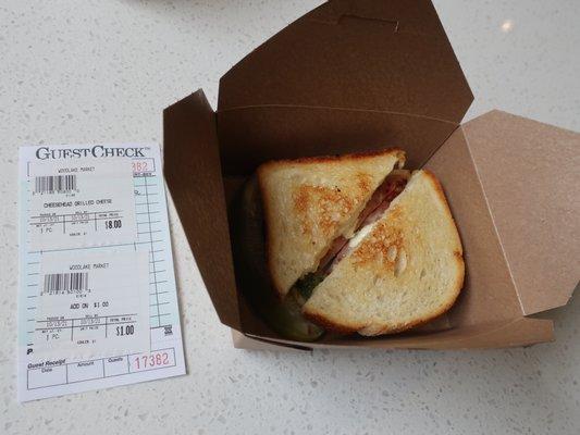 A nice grilled cheese with ham sandwich for $9 here.