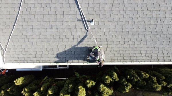 Installing new gutter system on a 2-story home