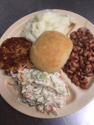 Fried salmon patties,purple hull peas,mashed taters,& cole slaw