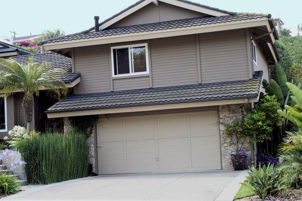 Our 4" Storm Master Gutter all but vanishes on the flashing of a Cal-Pac roof.