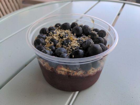 Acai Bowl with Blueberries, Toasted Coconut, Granola, and Hemp Seeds.