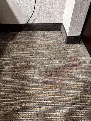 Stain on floor inside room 101