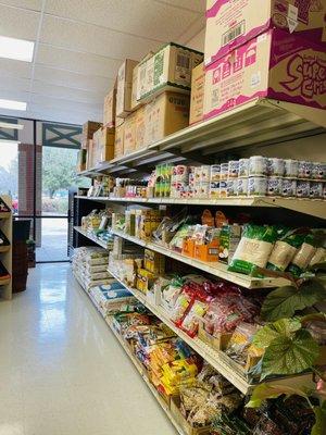 1st aisle - Rice and dried goods; noodles on the opposite side