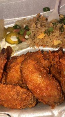 10 piece buffalo chicken plate with shrimp fried rice and side salad .