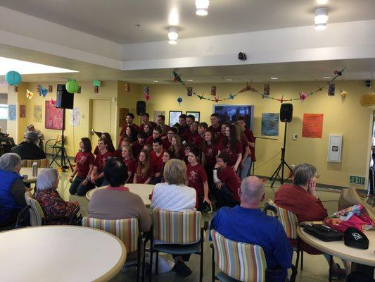 CCC organized singing group in senior building. The elderly enjoyed the lovely performance by the youth!