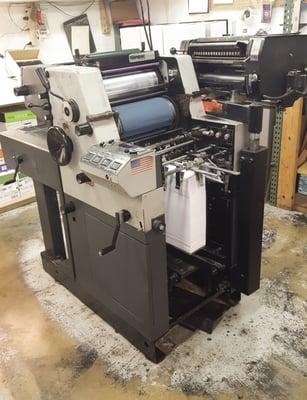 Kompac offset printer.