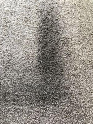 Carpet stain before the cleaning process.