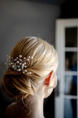 The back of my hair, with a pearl comb.