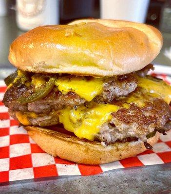 Double Cheeseburger with grilled jalapeños on a brioche bun. DELICIOUSNESS OVERLOAD!