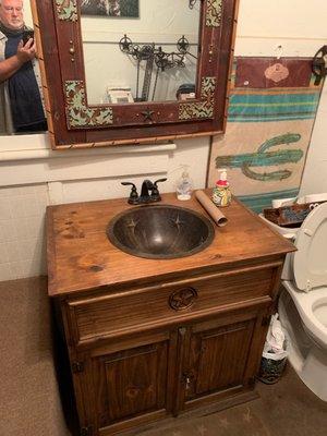 Several rustic vanities!