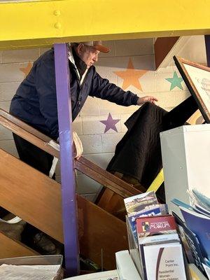 Rocky taking the piano up the stairs.