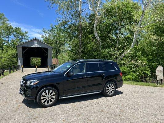 Passengers enjoying the Mercedes at the covered bridge in Canal Winchester!