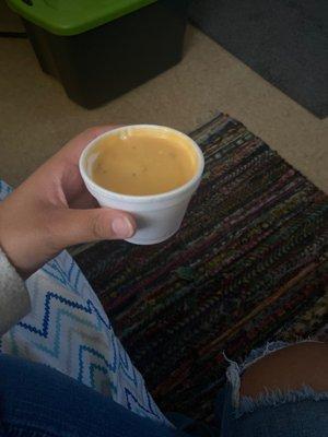 cup of soup? or soup poured into a salad dressing container?