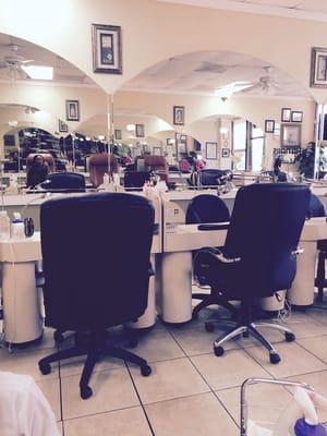 Plenty of pedicure seats with massagers and one kiddie pedicure chair. }:{