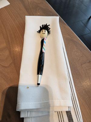 Cute pen used to add tip and sign check