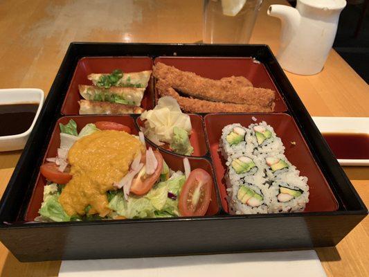 Pork Katsu lunch bento box.  No miso soup, 4pices Katsu, 3 gyoza.   No miso soup.